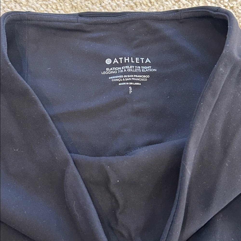 Athleta Black Elation Eyelet 7/8 tight Leggings with Gray  Floral Design. Size S - Picture 3 of 3